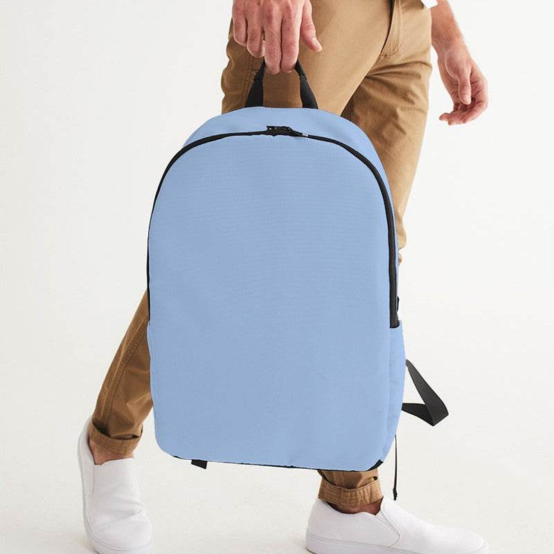Light Muted Blue Waterproof Backpack (IB2-MU-LI) - Man Holding CloseUp