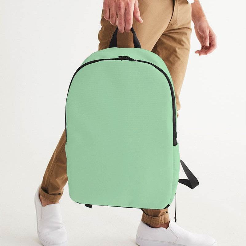 Light Muted Green Waterproof Backpack (G-MU-LI) - Man Holding CloseUp