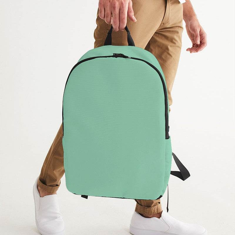 Lightened Muted Green Waterproof Backpack (BGG2-MU-LG) - Man Holding CloseUp