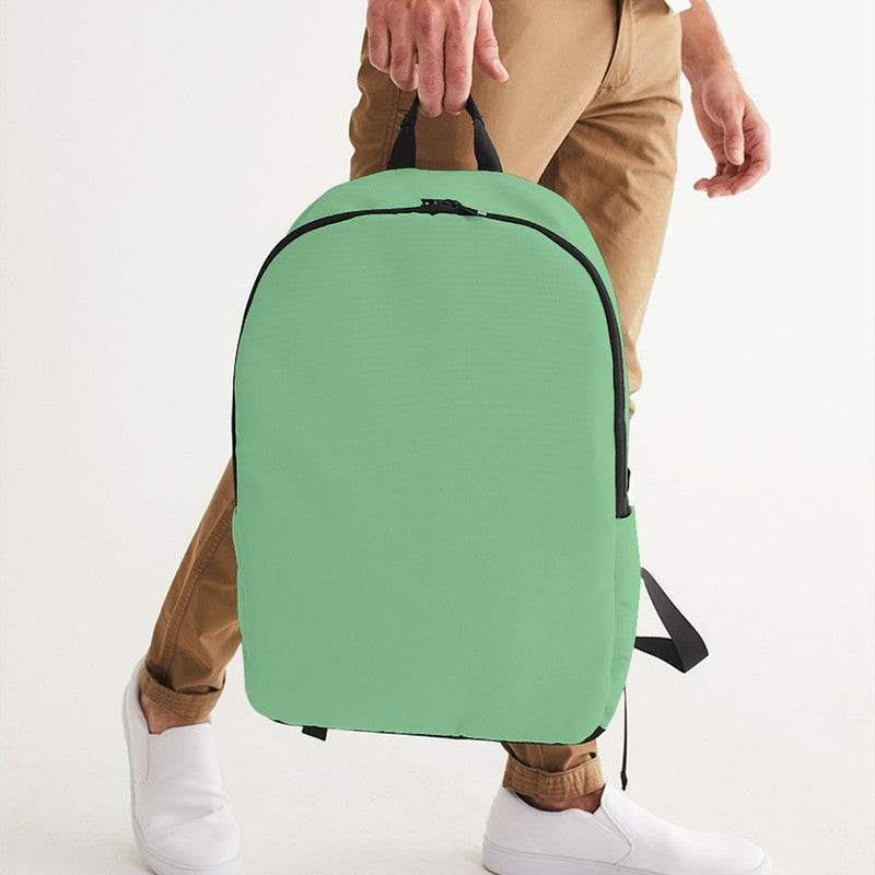 Lightened Muted Green Waterproof Backpack (G-MU-LG) - Man Holding CloseUp