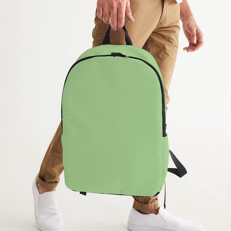 Lightened Muted Lime Waterproof Backpack (GL2-MU-LG) - Man Holding CloseUp
