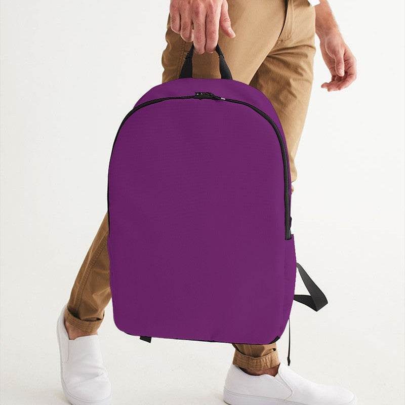 Medium-Dark Medium Magenta Waterproof Backpack (M-ME-MD) - Man Holding CloseUp