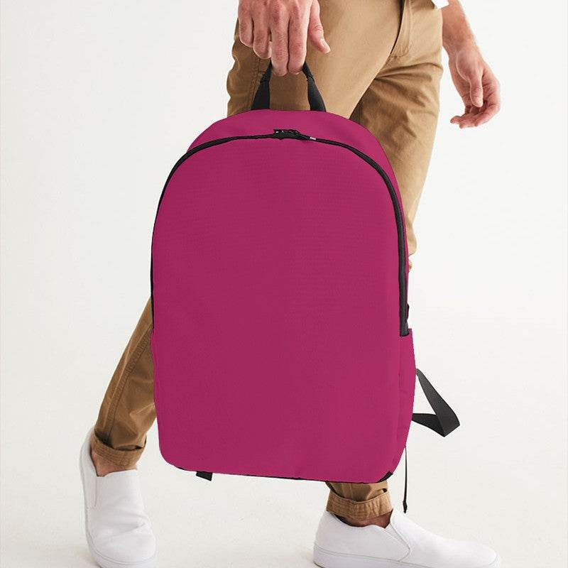Medium-Dark Medium Pink Waterproof Backpack (PI-ME-MD) - Man Holding CloseUp