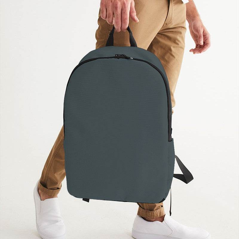 Medium-Dark Neutral Cyan Waterproof Backpack (C-NE-MD) - Man Holding CloseUp