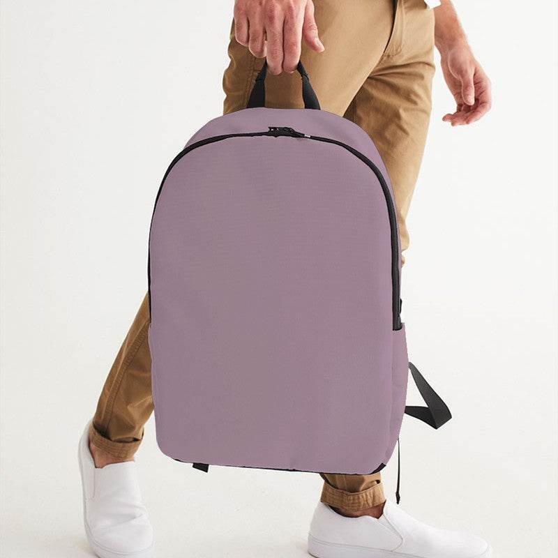 Medium-Light Neutral Magenta Waterproof Backpack (PIM2-NE-ML) - Man Holding CloseUp