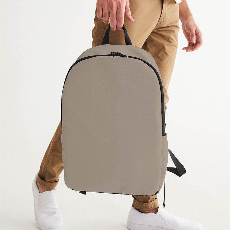 Medium-Light Neutral Orange Waterproof Backpack (O-NE-ML) - Man Holding CloseUp
