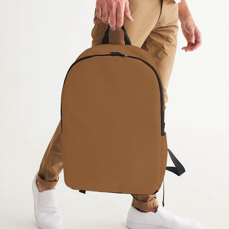 Metallic Bronze Waterproof Backpack (O-MU-MD) - Man Holding CloseUp