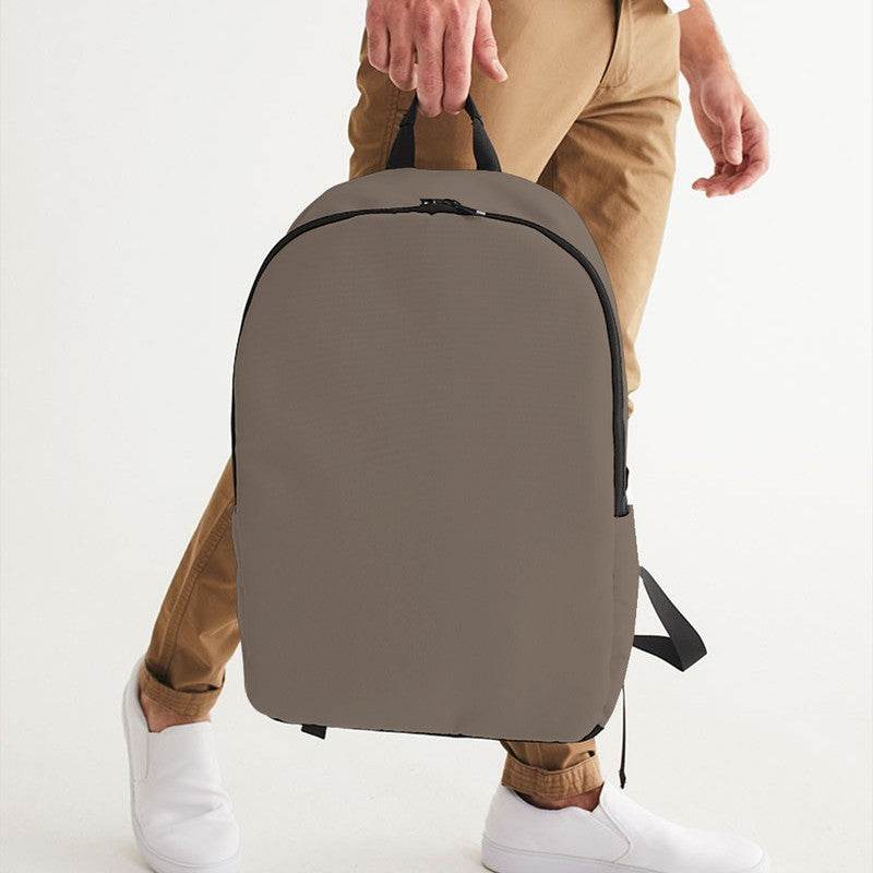 Taupe Haze Waterproof Backpack (O-NE-ME) - Man Holding CloseUp