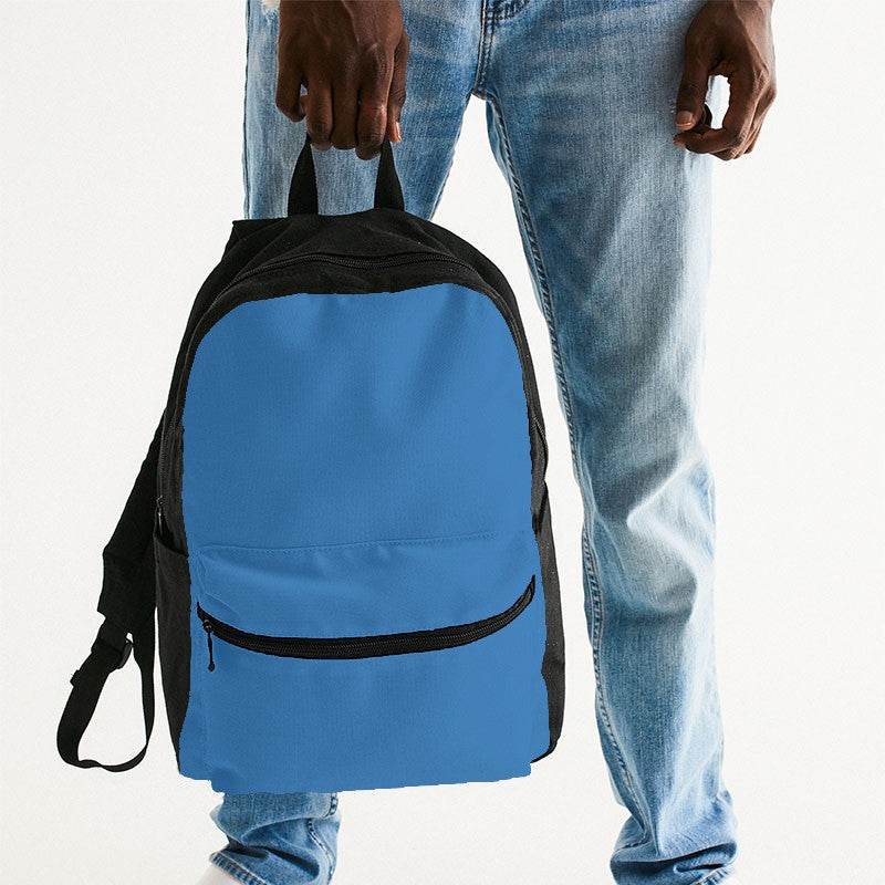 Bright Blue Canvas Backpack (IB3-BR-ME) - Man Holding