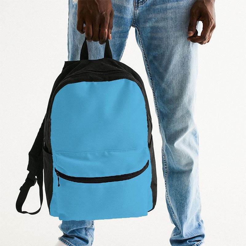 Bright Cyan Canvas Backpack (BC1-BR-ME) - Man Holding