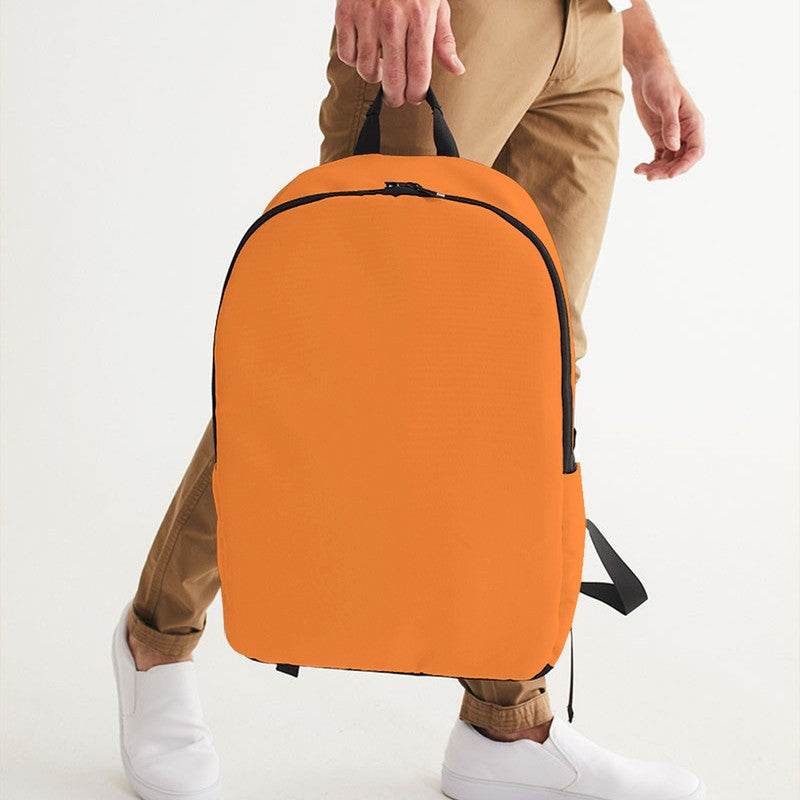Bright Orange Waterproof Backpack (OR1-BR-ME) - Man Holding CloseUp