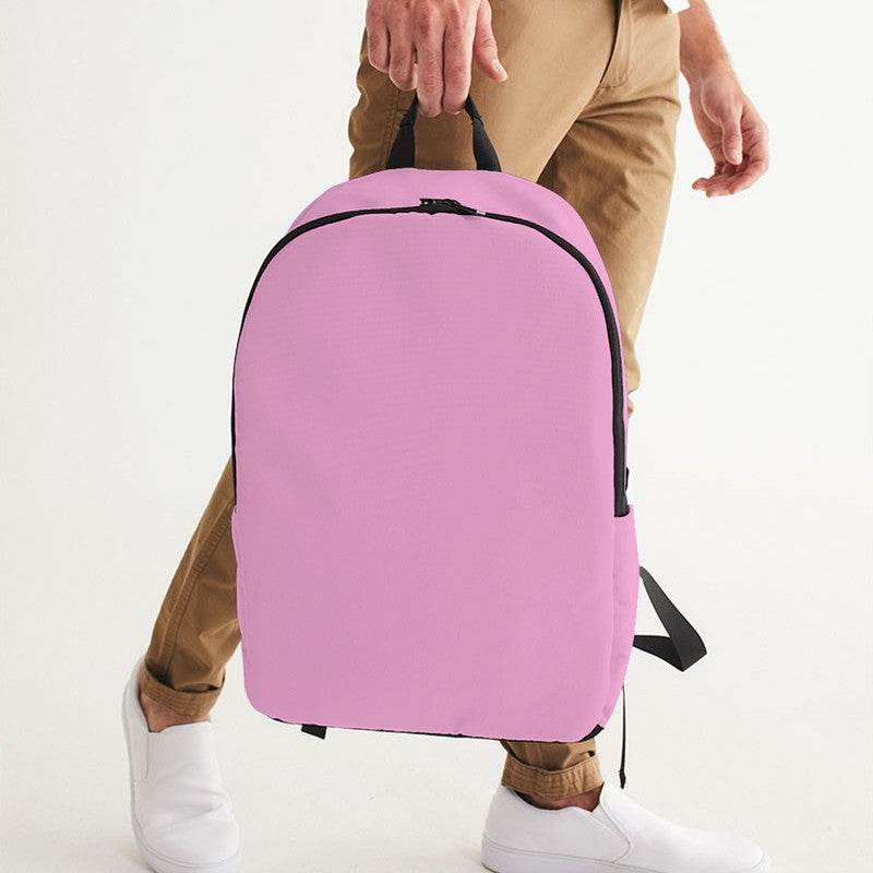 Bubblegum Pink Waterproof Backpack (PIM2-MU-LI) - Man Holding CloseUp