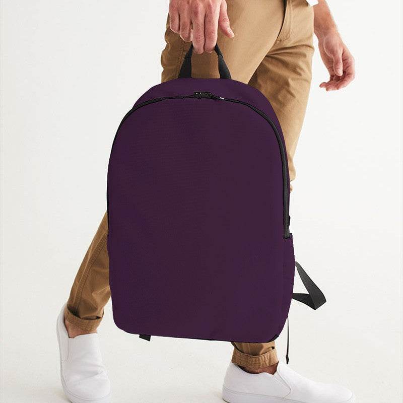 Dark Fully-Muted Magenta Waterproof Backpack (M-FM-DA) - Man Holding CloseUp