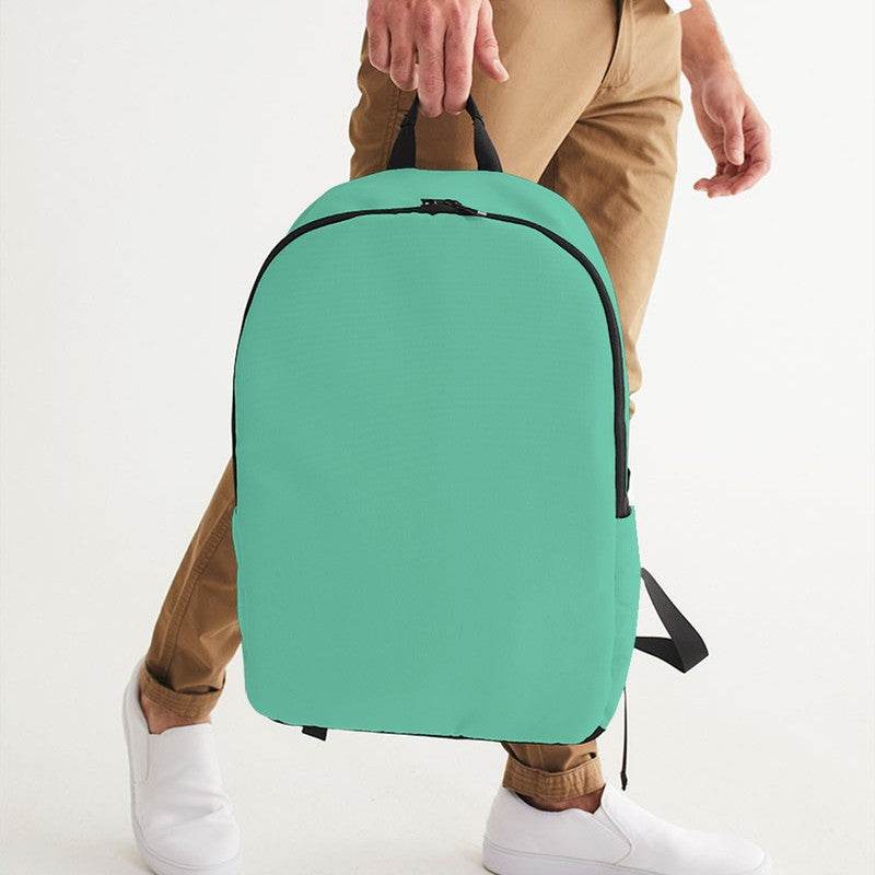 Light Clear Blue-Green Waterproof Backpack (BGG1-CL-LI) - Man Holding CloseUp