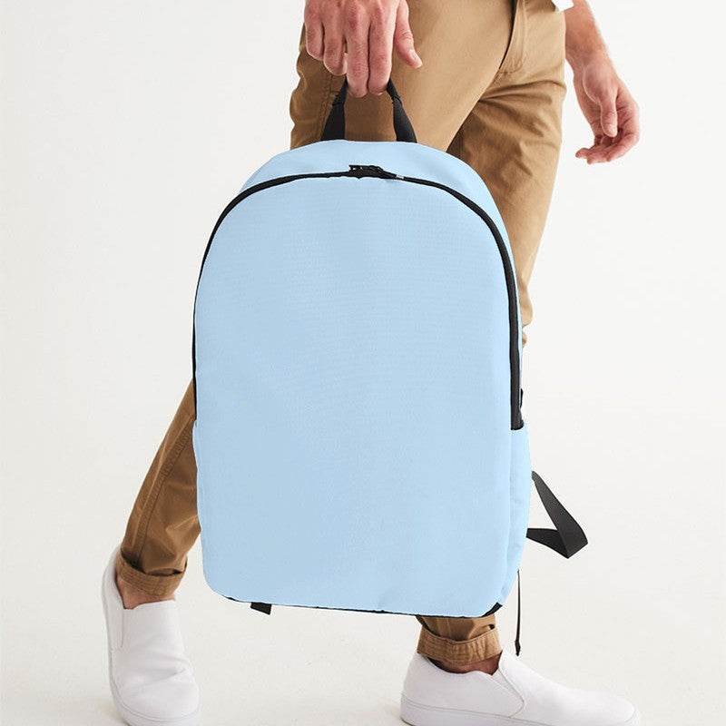 Light Fully-Muted Blue Waterproof Backpack (B-FM-LI) - Man Holding CloseUp