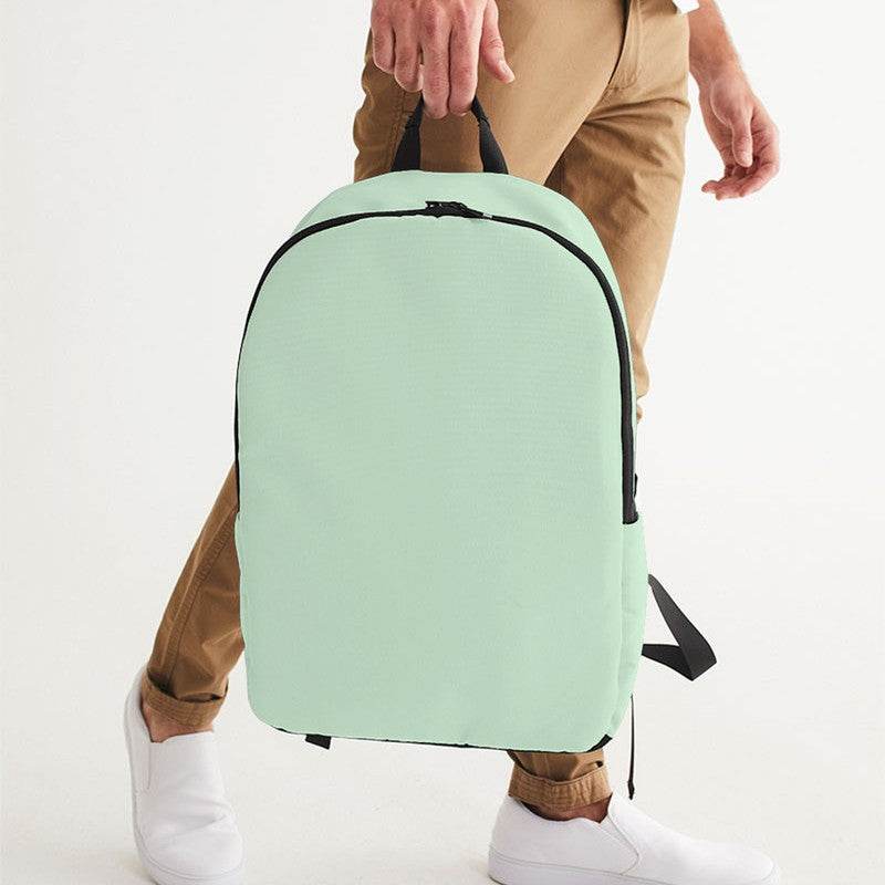 Light Fully-Muted Green Waterproof Backpack (G-FM-LI) - Man Holding CloseUp