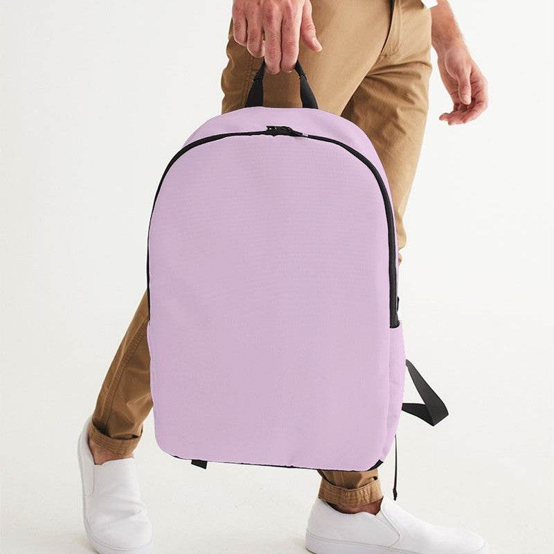 Light Fully-Muted Magenta Waterproof Backpack (M-FM-LI) - Man Holding CloseUp
