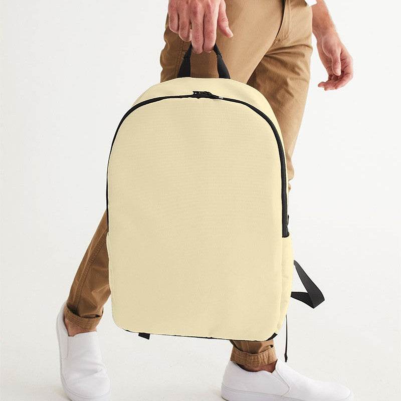 Light Fully-Muted Yellow Waterproof Backpack (Y-FM-LI) - Man Holding CloseUp