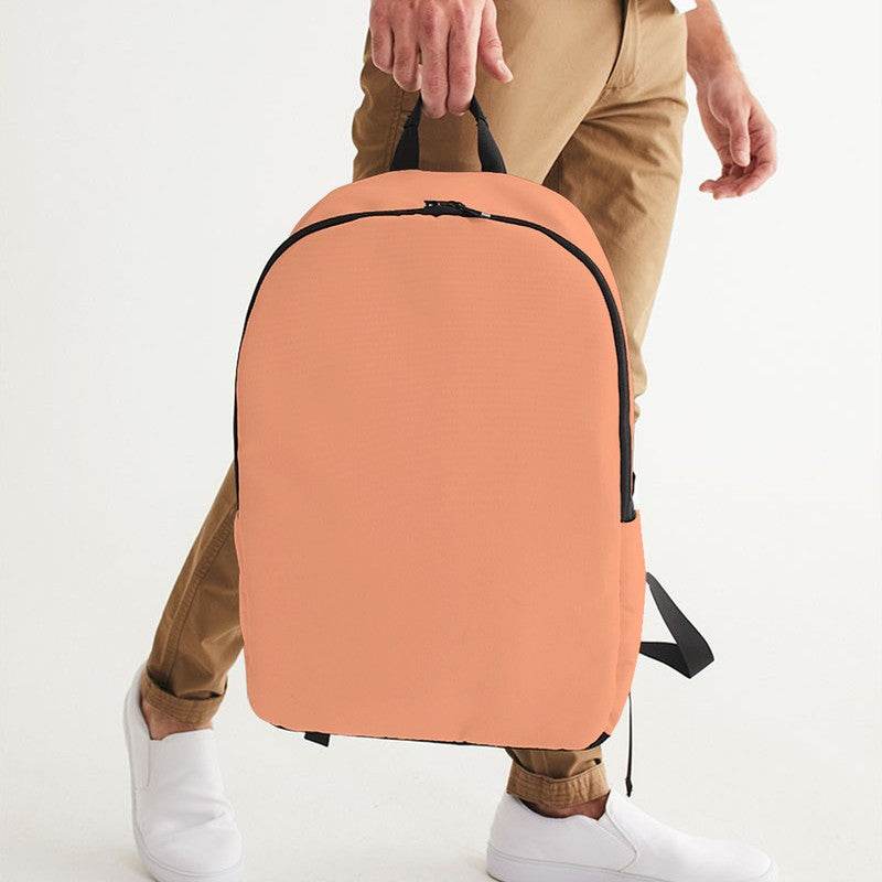 Light Medium Orange Waterproof Backpack (OR2-ME-LI) - Man Holding CloseUp