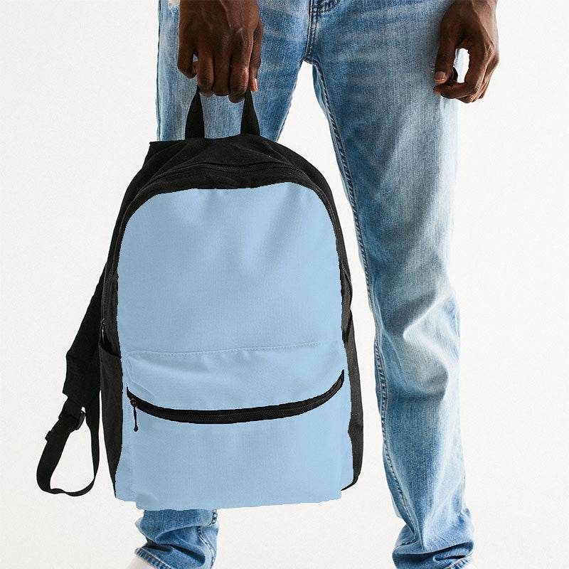 Light Muted Blue Canvas Backpack (B-MU-LI) - Man Holding