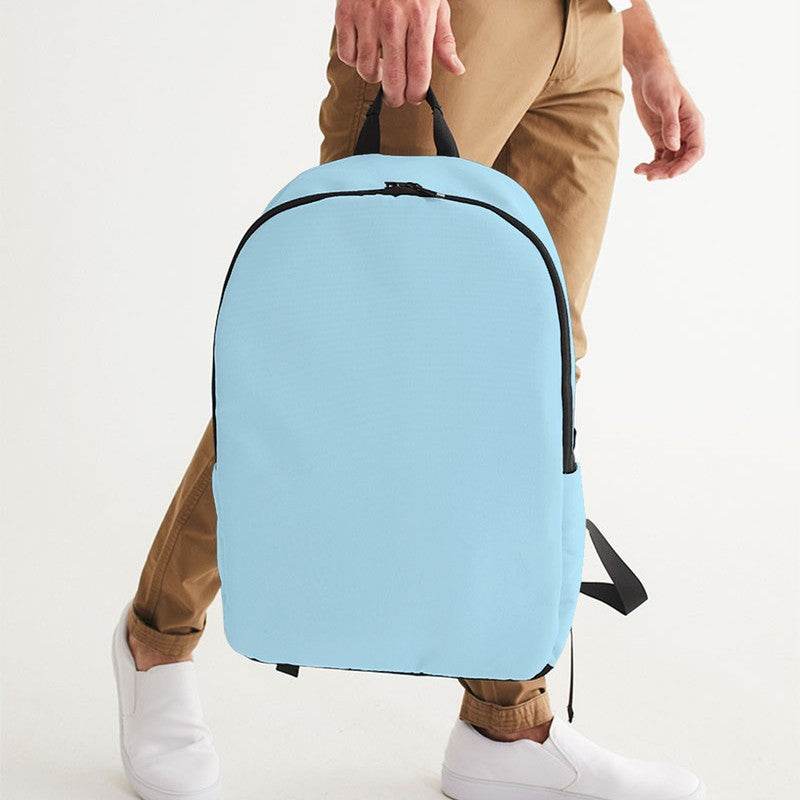 Light Muted Cyan Waterproof Backpack (BC2-MU-LI) - Man Holding CloseUp