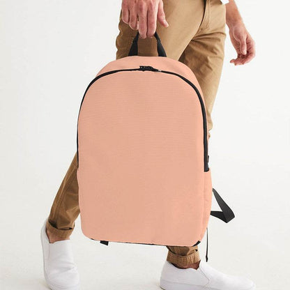 Light Muted Orange Waterproof Backpack (OR2-MU-LI) - Man Holding CloseUp