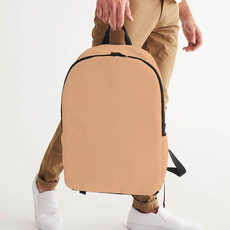 Lightened Muted Orange Waterproof Backpack (O-MU-LG) - Man Holding CloseUp