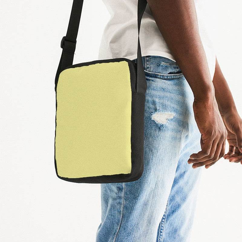 Lightened Muted Yellow Messenger Pouch (LY2-MU-LG) - Man Side CloseUp
