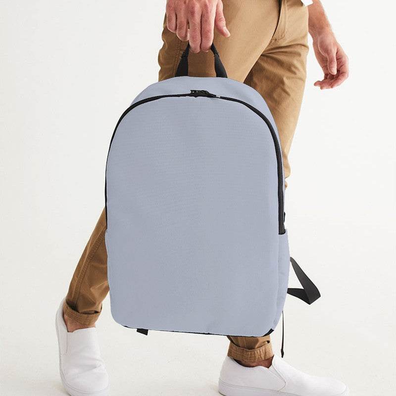 Lightened Neutral Indigo Waterproof Backpack (I-NE-LG) - Man Holding CloseUp