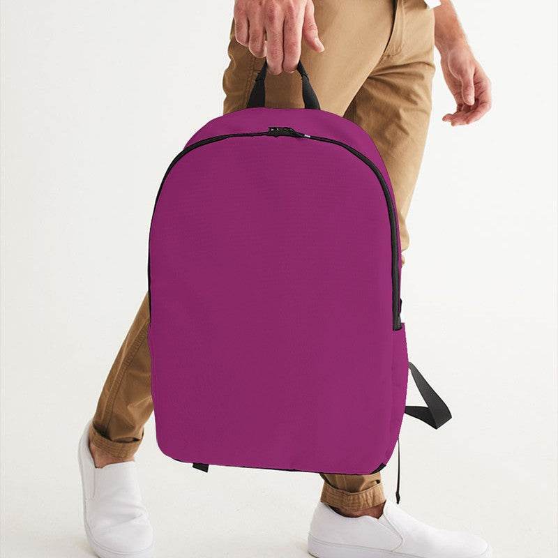 Medium-Dark Medium Magenta Waterproof Backpack (PIM2-ME-MD) - Man Holding CloseUp
