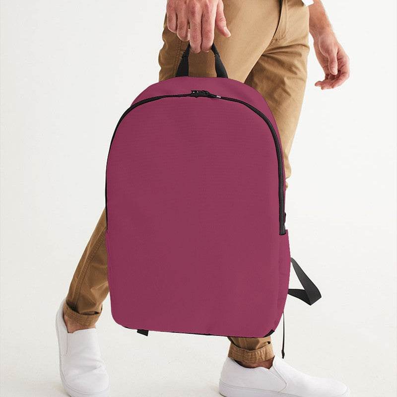 Medium-Dark Muted Pink Waterproof Backpack (PI-MU-MD) - Man Holding CloseUp