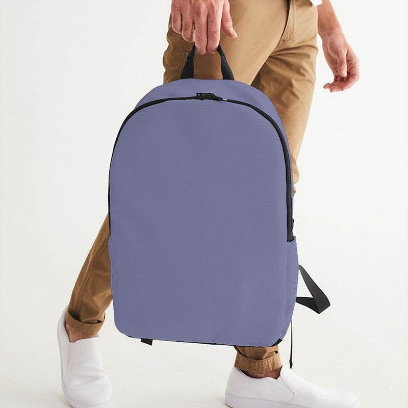 Medium-Light Fully-Muted Indigo Waterproof Backpack (PUI2-FM-ML) - Man Holding CloseUp