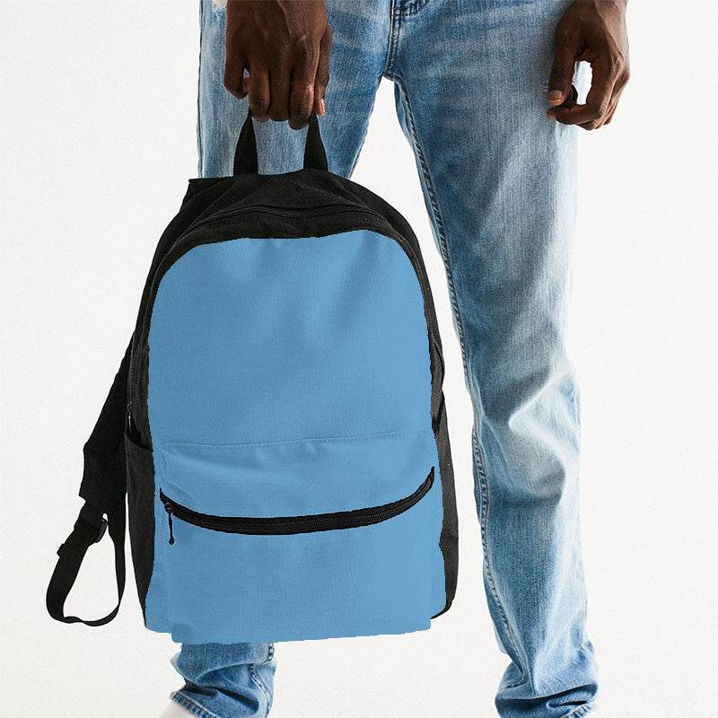 Medium-Light Medium Blue Canvas Backpack (B-ME-ML) - Man Holding