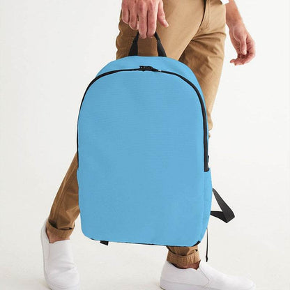 Medium-Light Medium Cyan Waterproof Backpack (BC1-ME-ML) - Man Holding CloseUp