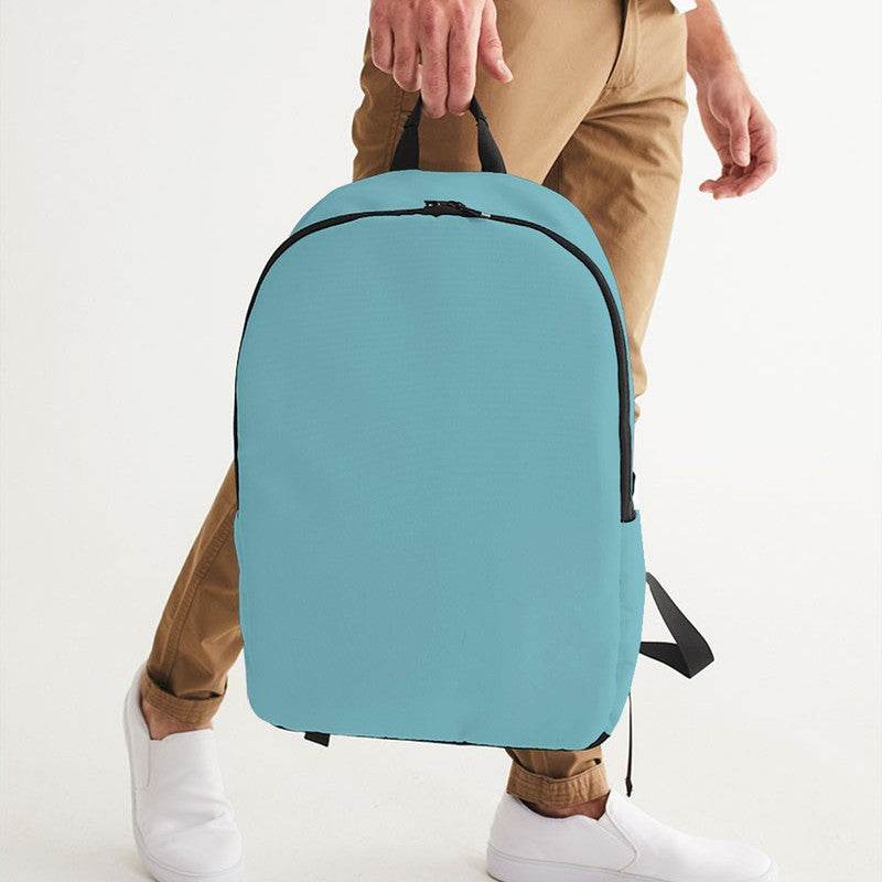 Medium-Light Muted Cyan Waterproof Backpack (C-MU-ML) - Man Holding CloseUp