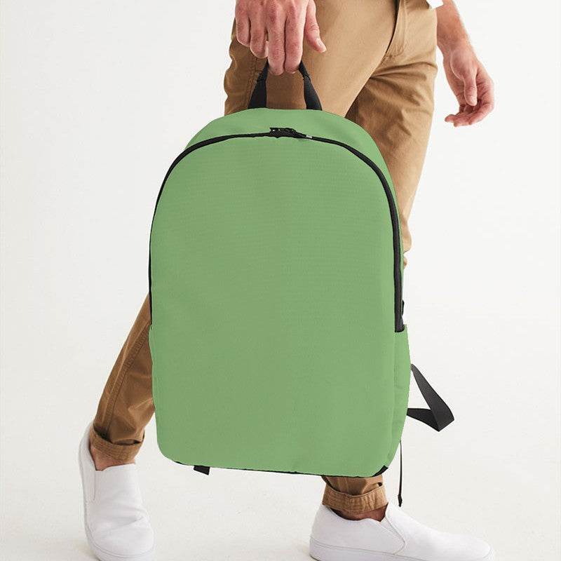 Medium-Light Muted Lime Waterproof Backpack (GL2-MU-ML) - Man Holding CloseUp