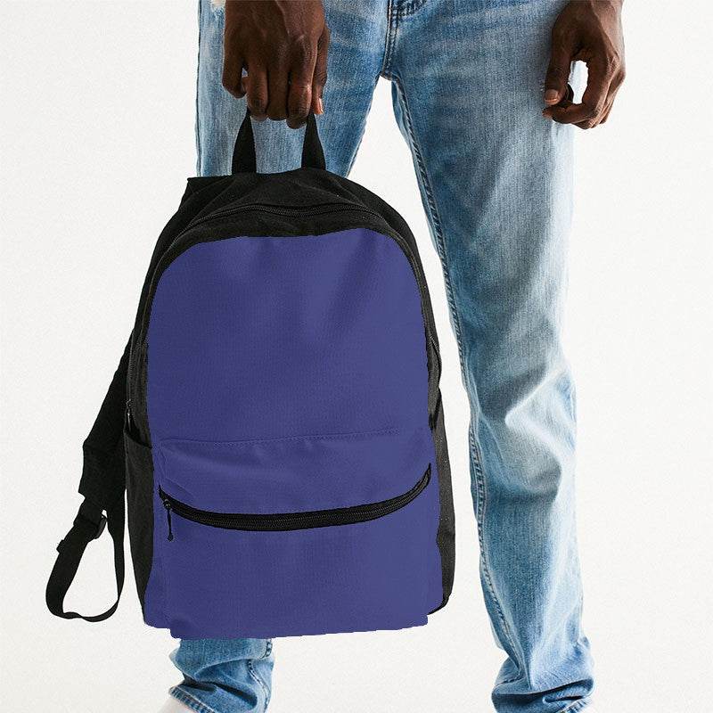 Medium Indigo Canvas Backpack (PUI3-ME-ME) - Man Holding