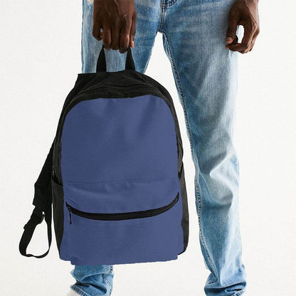 Medium Muted Indigo Canvas Backpack (I-MU-ME) - Man Holding