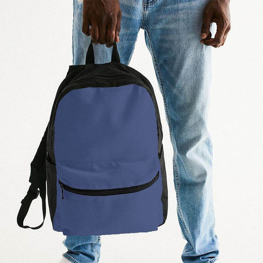 Medium Muted Indigo Canvas Backpack (I-MU-ME) - Man Holding