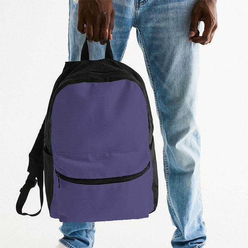 Medium Muted Indigo Canvas Backpack (PUI2-MU-ME) - Man Holding