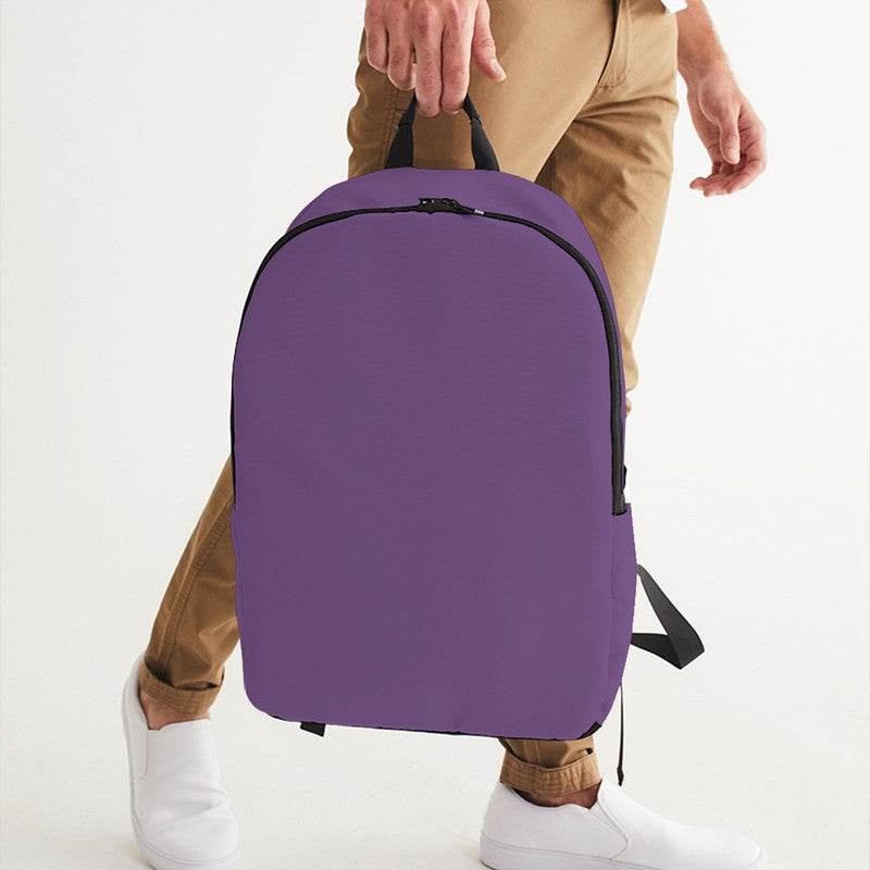 Medium Muted Purple Waterproof Backpack (MPU2-MU-ME) - Man Holding CloseUp