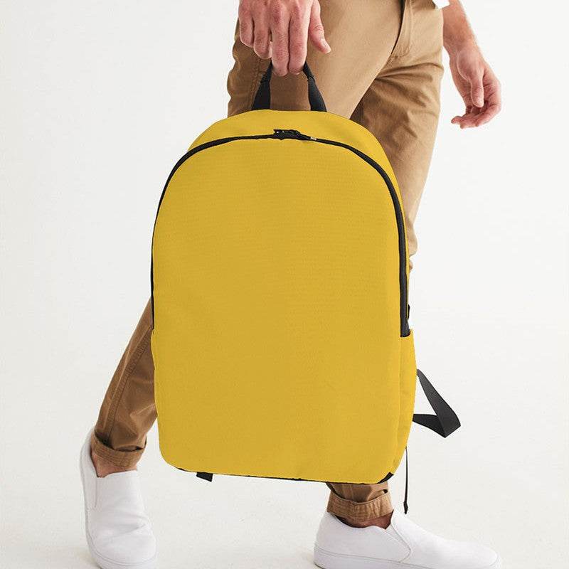 Mustard Waterproof Backpack (Y-CL-ME) - Man Holding CloseUp