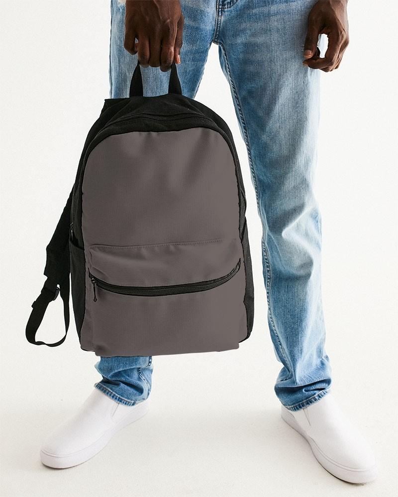 Dark Brown Canvas Backpack C60M60Y60K30 - Man Holding