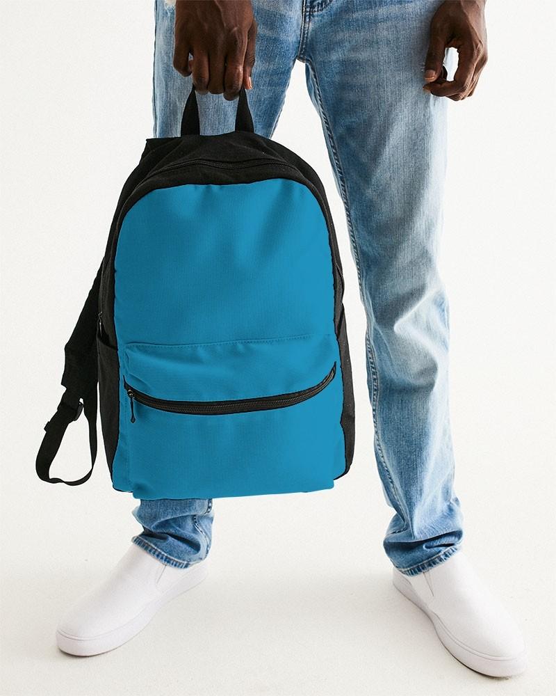 Muted Cyan Canvas Backpack C100M0Y0K30 - Man Holding